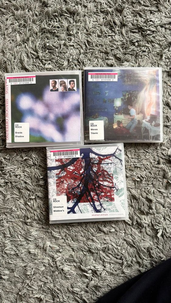 3 CDs: Shadow Offering by Braids, Titanic Rising by Weyes Blood, and Widow’s Weeds by Silversun Pickups