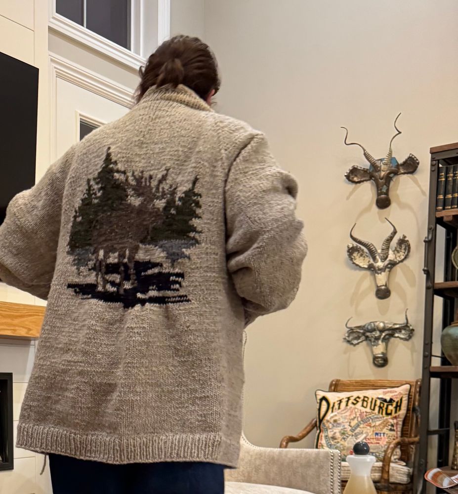 back of handknit cowichan-style sweater with moose design