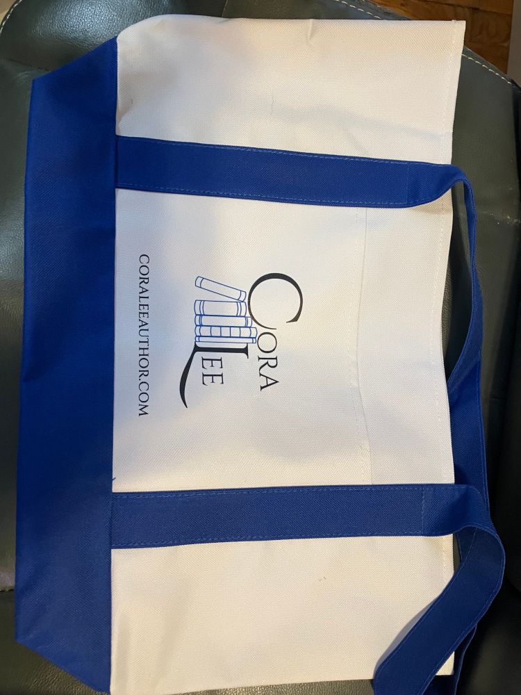 A small tote bag with Cora Lee's new logo.