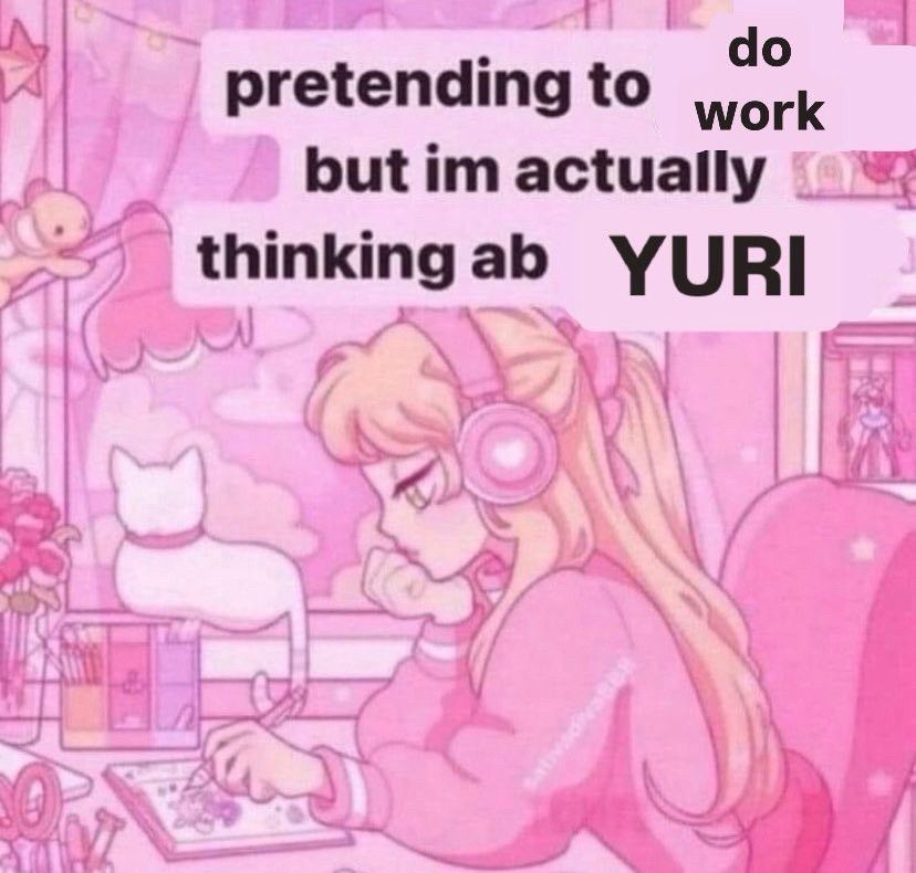 image of a person working on their desk with the caption "pretending to do work but im actually thinking about yuri"