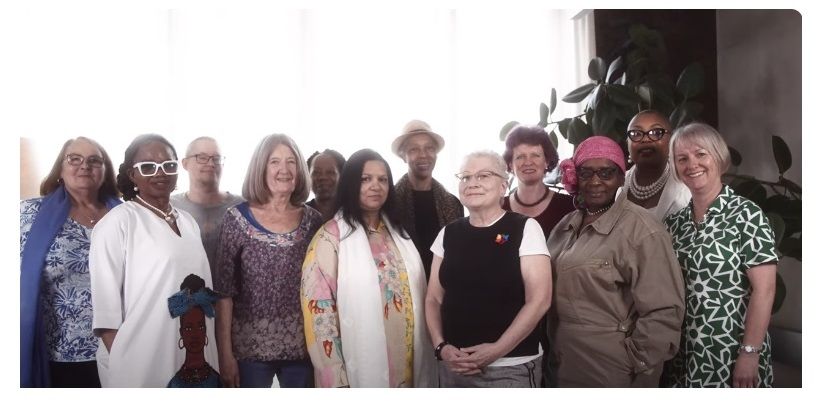 Image of 12 individuals from the Breast screening videos standing in a group.