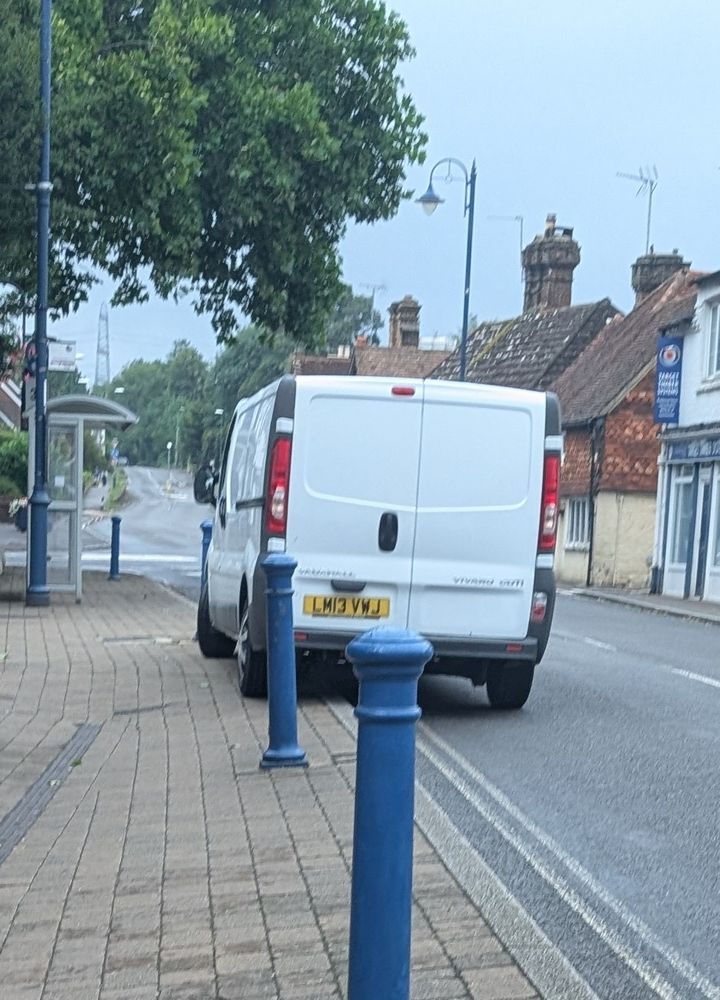 A van parked like an ABSOLUTE CUNT on double yellows, blocking a bus stop. 