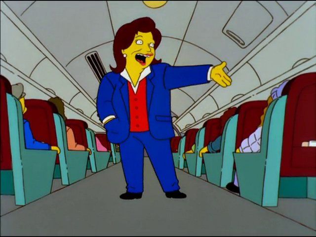 A Simpsons-ised Rosie O'Donnell belting out a number