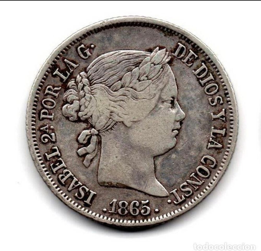 Moneda de 1865 de Isabel segunda.
Se ve su rostro mirando a la derecha.