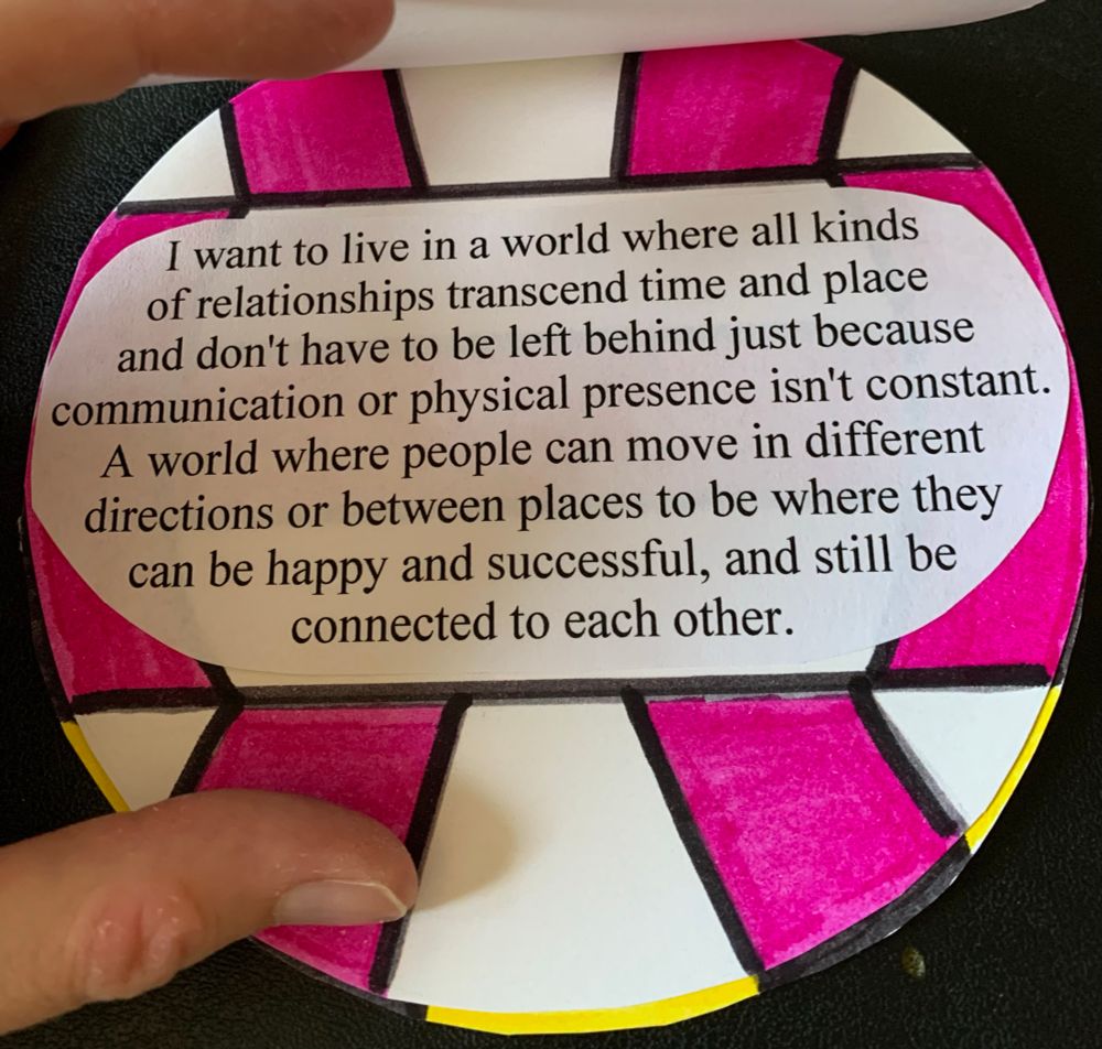 A page with a volleyball that is purple and white. The text says "I want to live in a world where all kinds of relationships transcend time and place and don't have to be left behind just because communication or physical presence isn't constant. A world where people can move in different directions or between places to be where they can be happy and successful, and still be connected to each other.