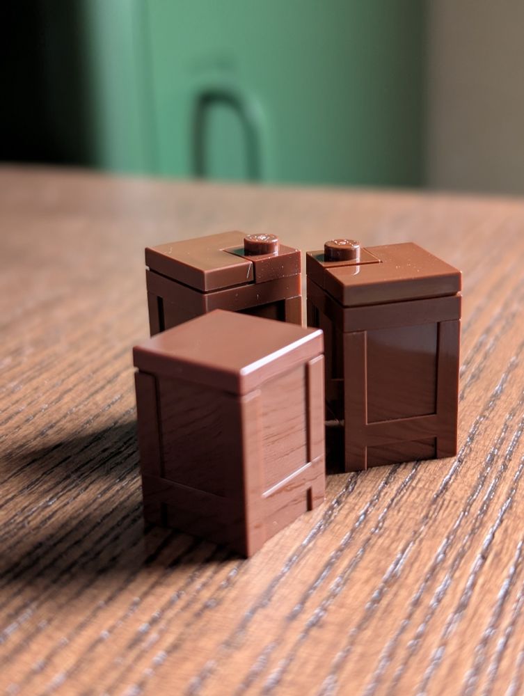 A simple but elegant crate stacking technique. Just attach the bottom corners of a crate to the studs to give the stack of crates a more organic look and feel.