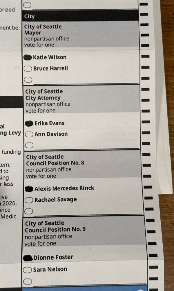 Portion of my 2026 King County WA ballot filled out with votes for some of the key positions in the city: votes for Wilson for mayor, Evans for city attorney, Rinck for council position 8, and Foster for council position 9.