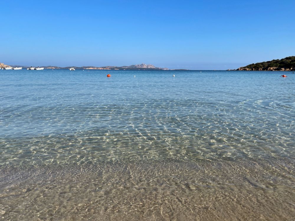 Empty beach under a blue sky