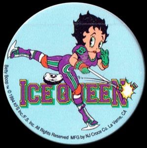 a pog with a light blue background. on top of the background are the words “ice queen” in a sports jersey kind of font in purple with a green drop shadow. in front of those words is Betty Boop wearing a purple and green cat suit jersey kind of thing and she is holding a hockey stick that has an action mark showing it made contact with something. the something is her dog which is also the puck and it’s in midair. 