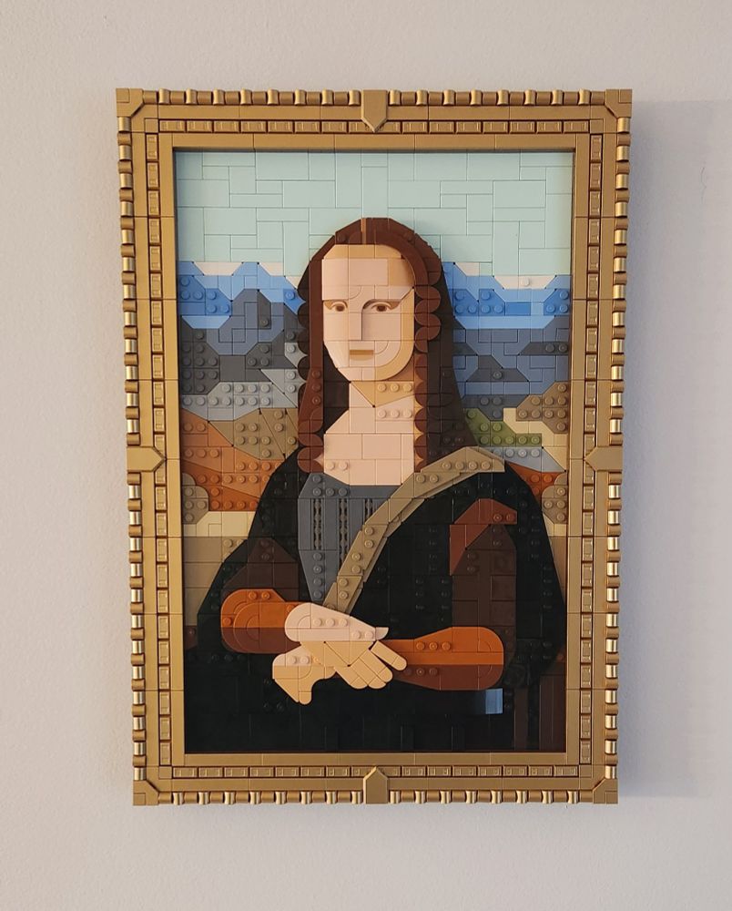Complete set of Lego Mona Lisa hanging on the wall.