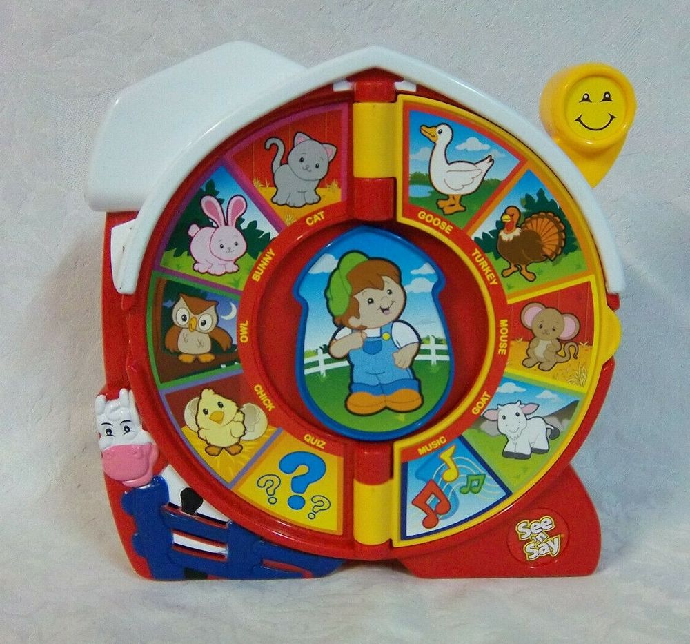 A See 'n Say toy with various farm animals arranged in a circle.