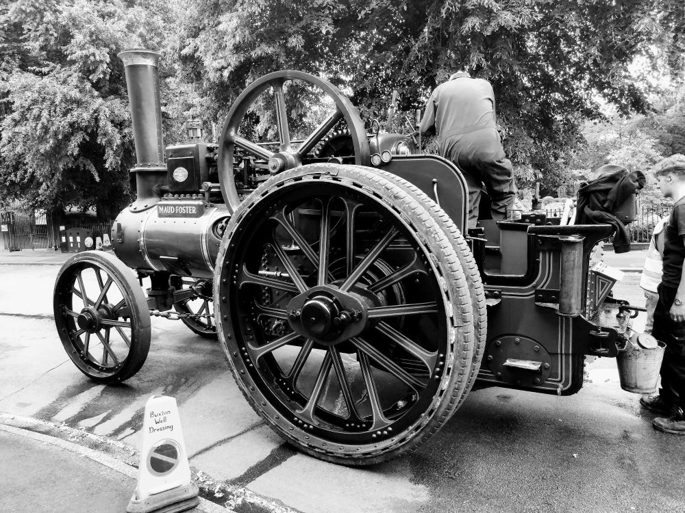 Black and white image of a traction engine in profile.