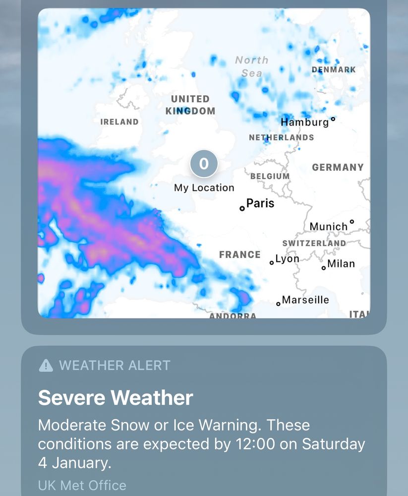 Photo of weather app showing Europe is cold and expecting snow.
