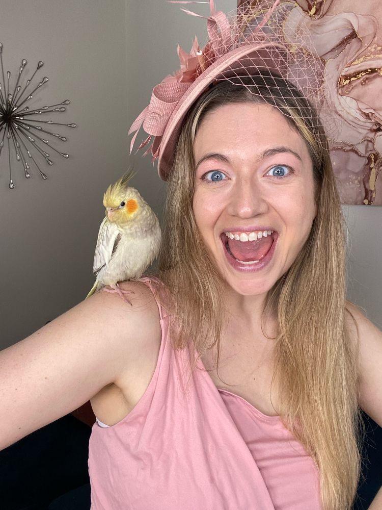 A picture of me with my cockatiel Luca