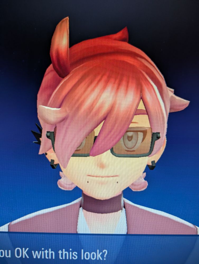 Shohei in PLZA with beauty marks under their lips so it looks like snakebite piercings 