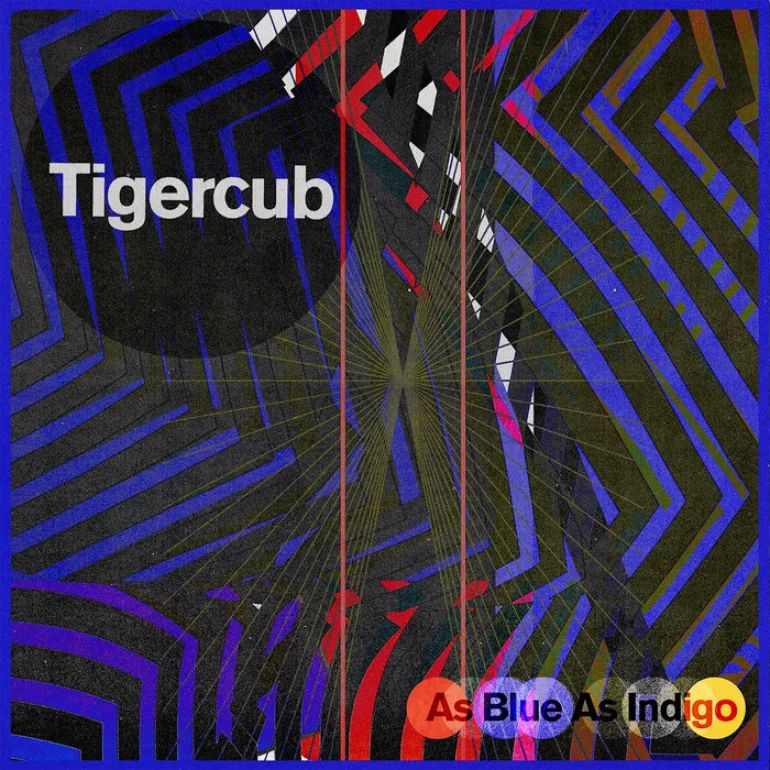 Cover art for Tigercub's album "As Blue As Indigo". It's a busy, abstract piece, heavily featuring deep indigo blues and dusty licorice blacks. There's a somewhat-chaotic intermingling of thick, wavy lines and straight, thin ones. The middle features some pops of scarlet and white, but it's not apparent what, if anything, is represented here. The band's name is printed in a darkened circle on the top left, and the album's name in a row of colourful circles in the bottom right. To me, it evokes the feeling of optical illusions or shock camouflage; the cover is striking, and seems to want to draw your attention as much as it wants to disorient you.