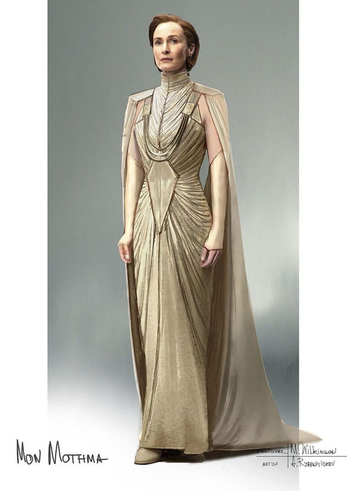 A photo of Mon Mothma’s attire from Andor, she wears a gold shimmering dress with fingerless gloves that reach past her elbows.