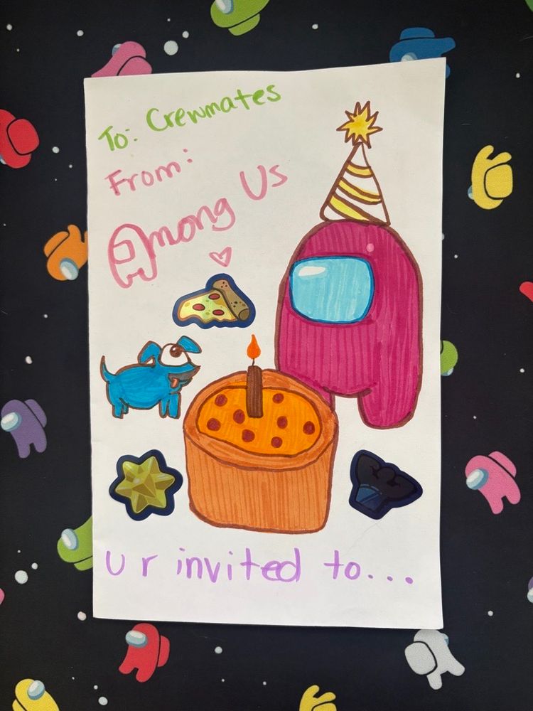 A hand-drawn birthday card depicting a Crewmate wearing a party hat, a Space Dog Pet, and a pizza cake. Text on the card says: 