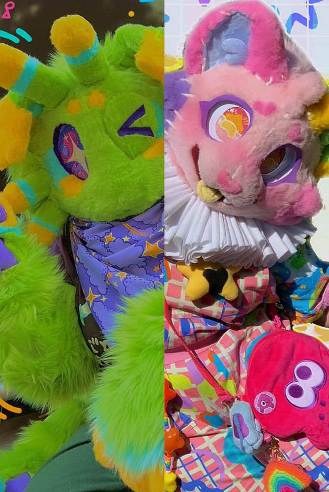 2 fursuits, on the left is is green with yellow and blue tipped antennas and big purple eyes with a large sparkle in the centre. It wears a purple bandana with yellow stars and green trousers. On the right is a pink cat with one pink and blue ear one yellow and green ear. They wear a clown ruffle collar around their neck and pink overalls with a pink squid shaped bag.