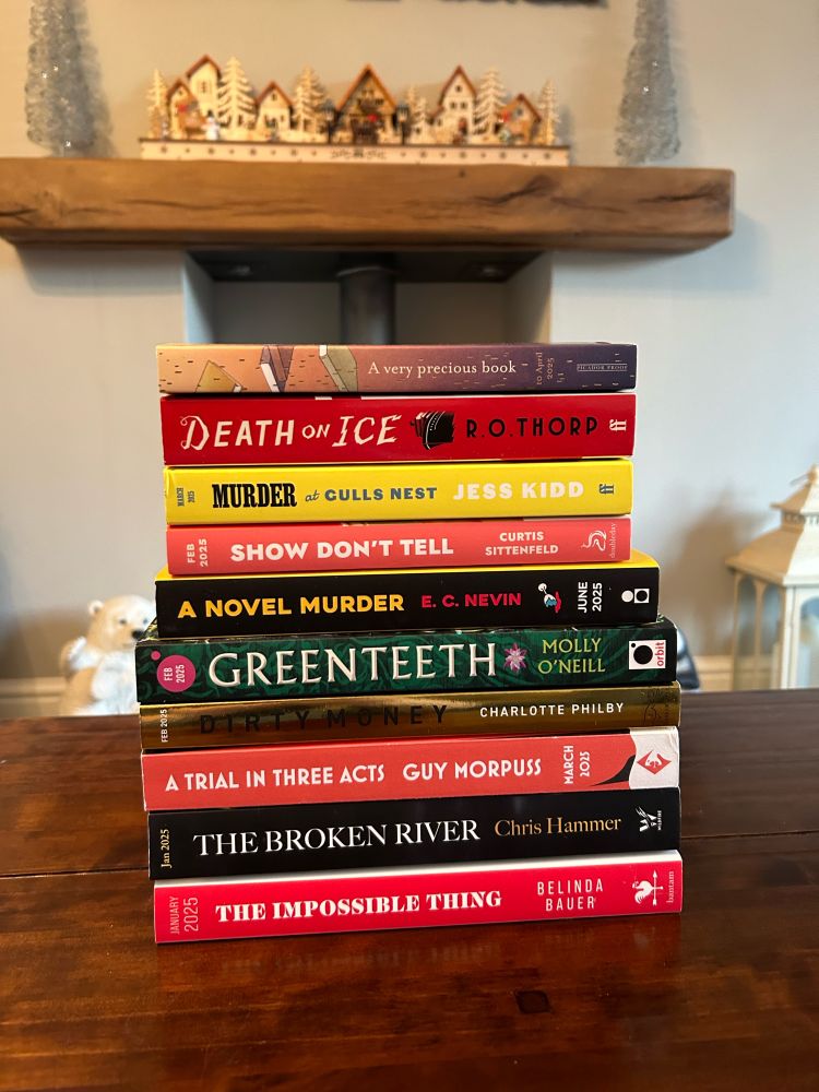 The Cat Who Saved the Library, Death on Ice, Murder at Gulls Nest, Show Don’t Tell, A Novel Murder, Greenteeth, Dirty Money, A Trial in Three Acts, The Broken River, The Impossible Thing.