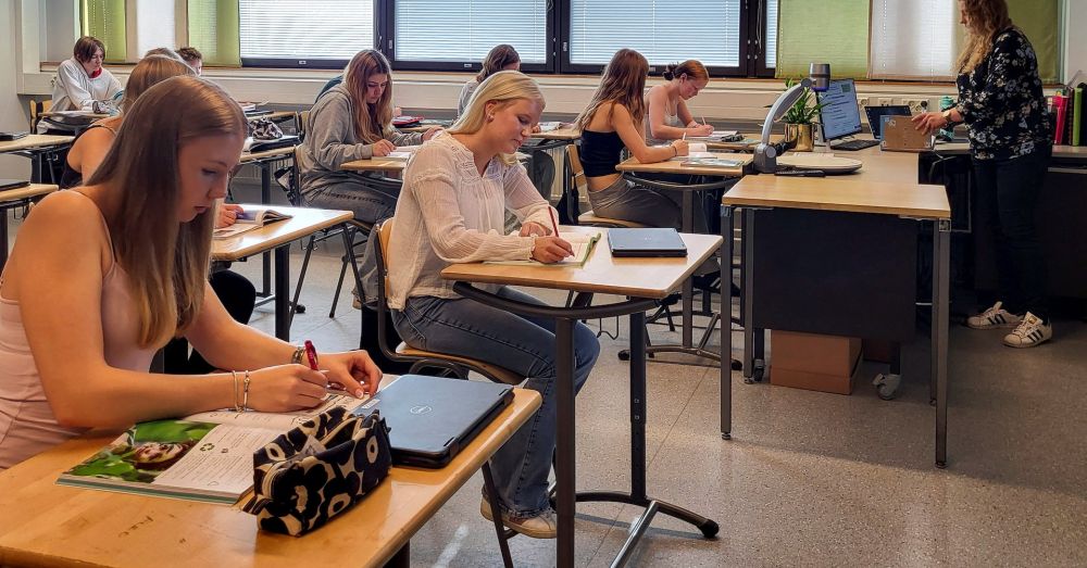 Books in, screens out: some Finnish pupils go back to paper after tech push