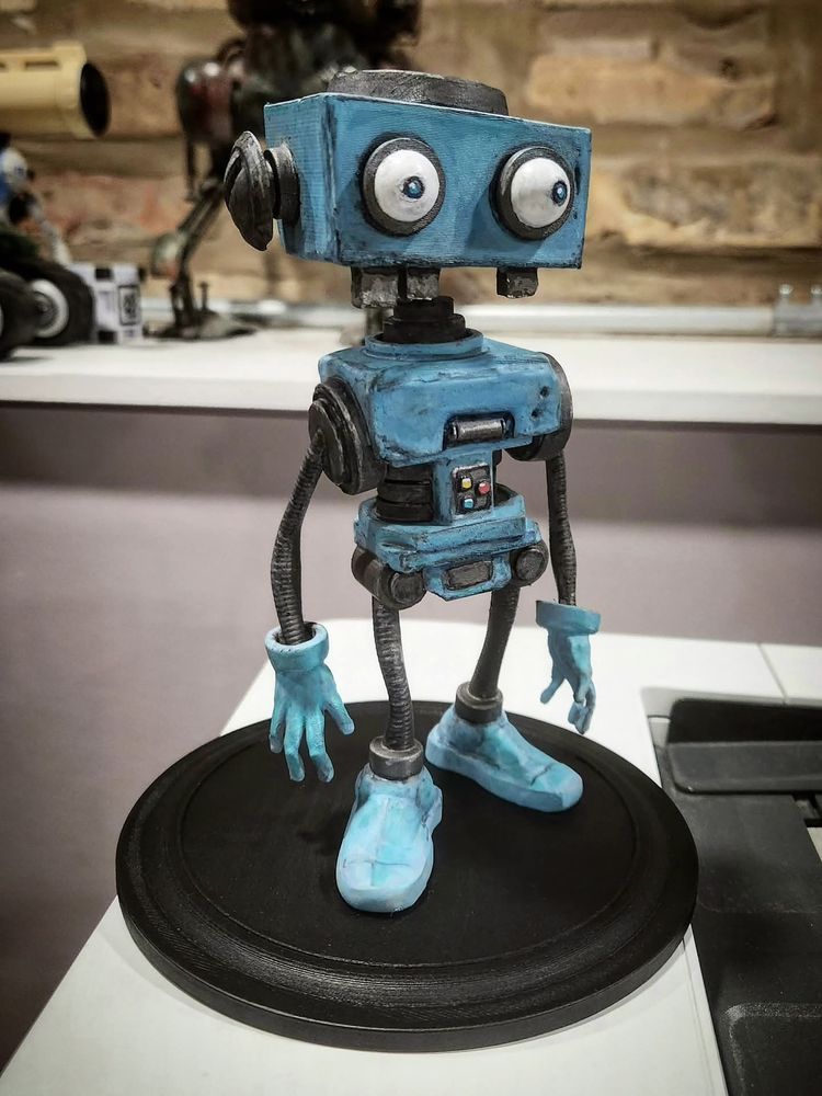 Painted 3D print of a robot figurine