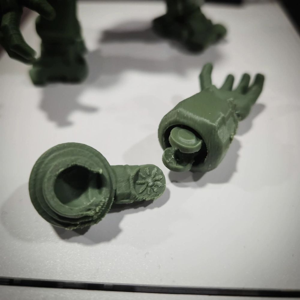 3D-printed arm parts for "Scrappers" robot figure