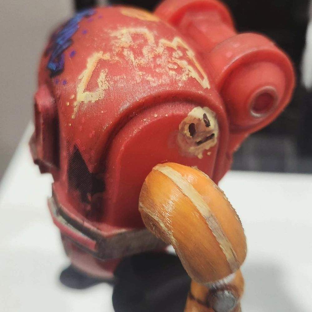 3D-printed robot figure, painted with graffiti deco