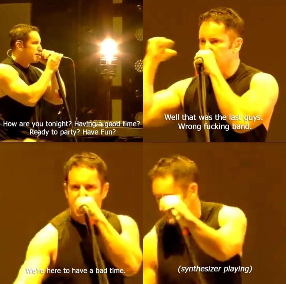 Trent Reznor informing the crowd that they are, in fact, in for a bad time.