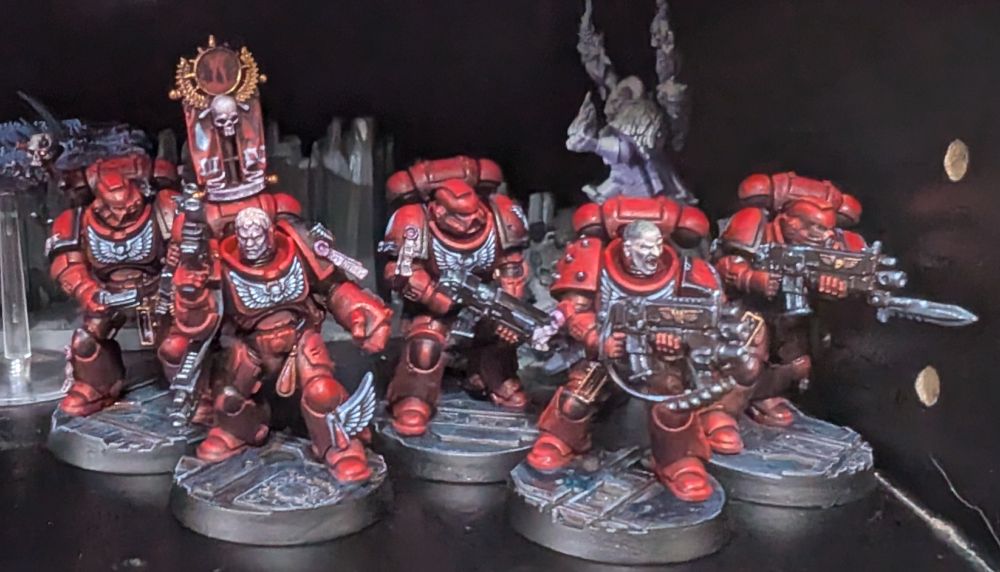A 5-man squad of Blood Angels Intercessors.