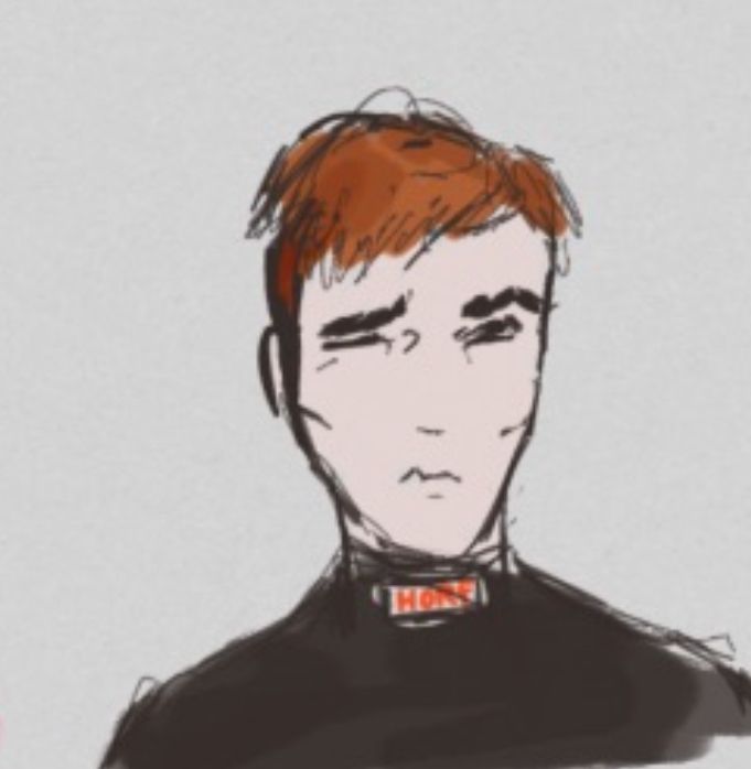 A scrungly small gaunt man in a black polo-neck equestrian underlayer, wincing in pain.