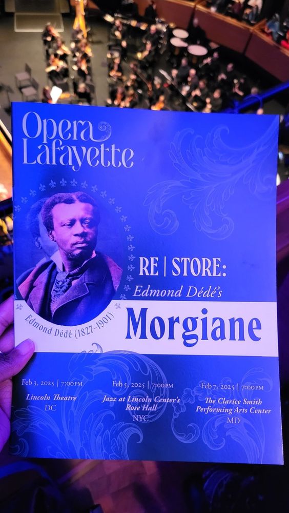 Photo of program from first opera by an African American, Edmond Dédé’s Morgiane from seat looking onto stage blue with image of dark-skinned and dignified Black man with formal dress and center part in hair)