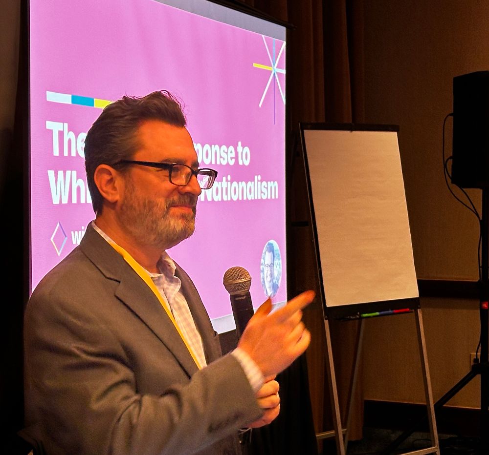 Picture of Paul Golin, Executive Director of the Society for Humanistic Judaism, speaking at a conference on the Jewish Response to Christian Nationalism. 