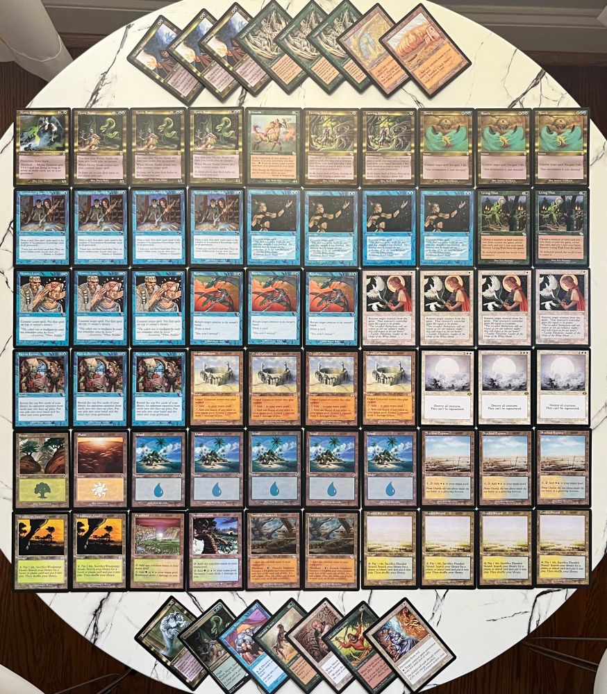 A white blue green control deck for the MTG premodern format, all laid out so every card is visible. A single mystic snake in the sideboard stands out with a modern frame, the rest is classic.