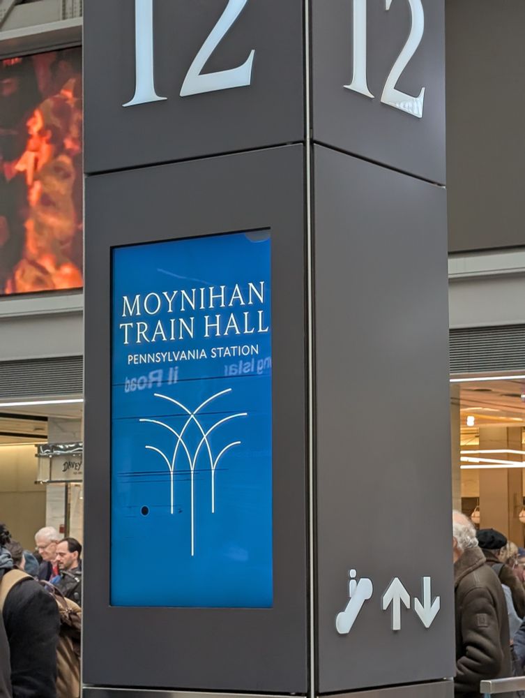 Gate 12 with a black dot and black horizontal lines plus a grey splotch at the top right