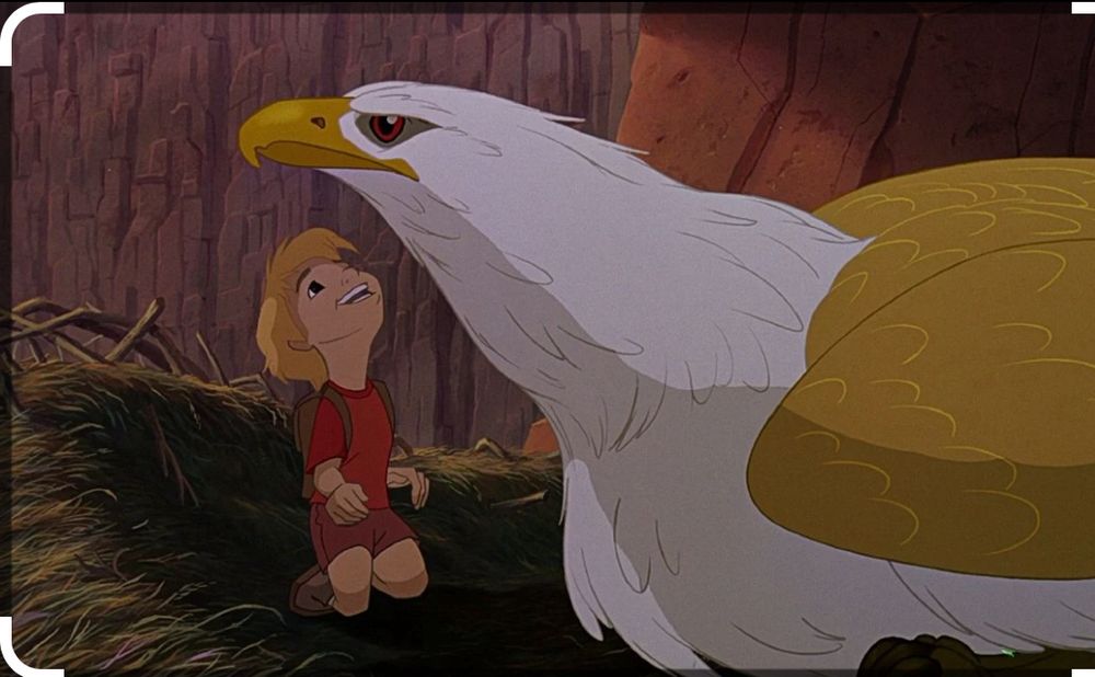 Imagen de los rescatadores en Cangurolandia. Es un niño rubio en el nido de un aguila dorada. El aguila es las grande que el.