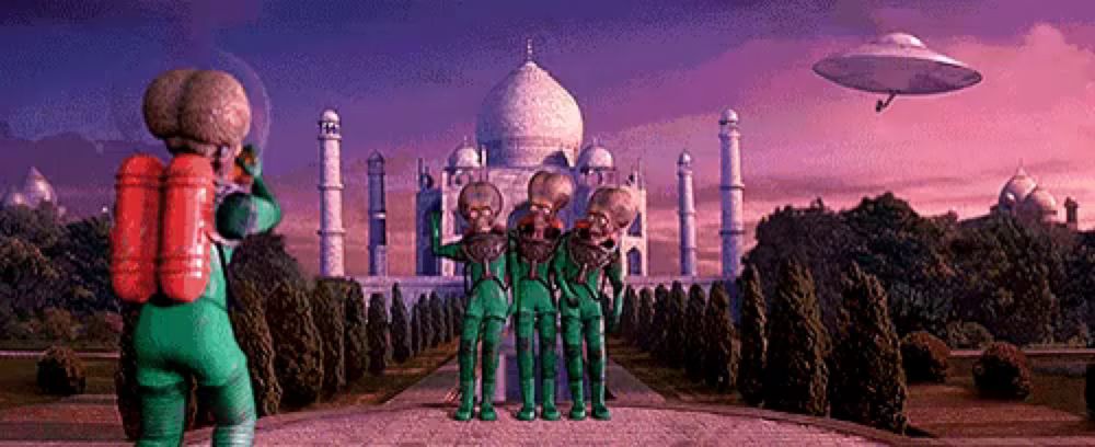 a group of aliens are standing in front of a temple