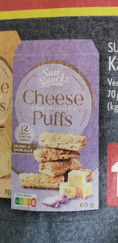 lecker Cheese Puffs als Snack, abfotografiert von Prospekt