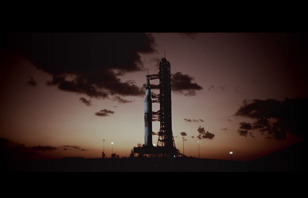 saturn v at the launch pad at dawn