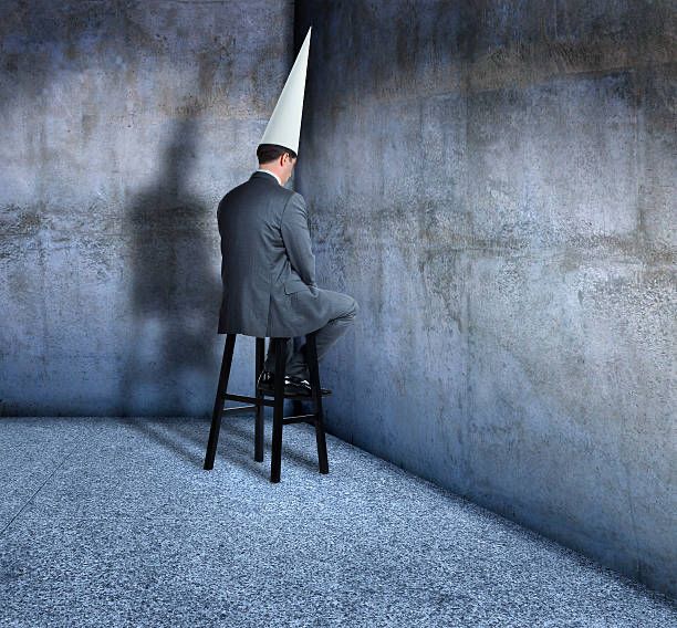 Dunce in corner
