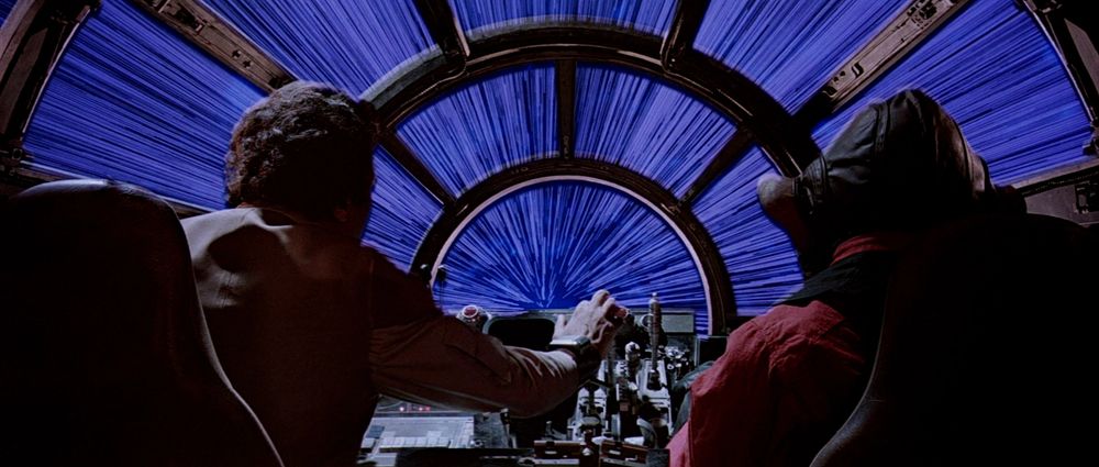 Entering hyperspace, which I know is not technically a wormhole.