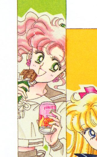 Makoto with a chocolate bar and a can of fruit juice