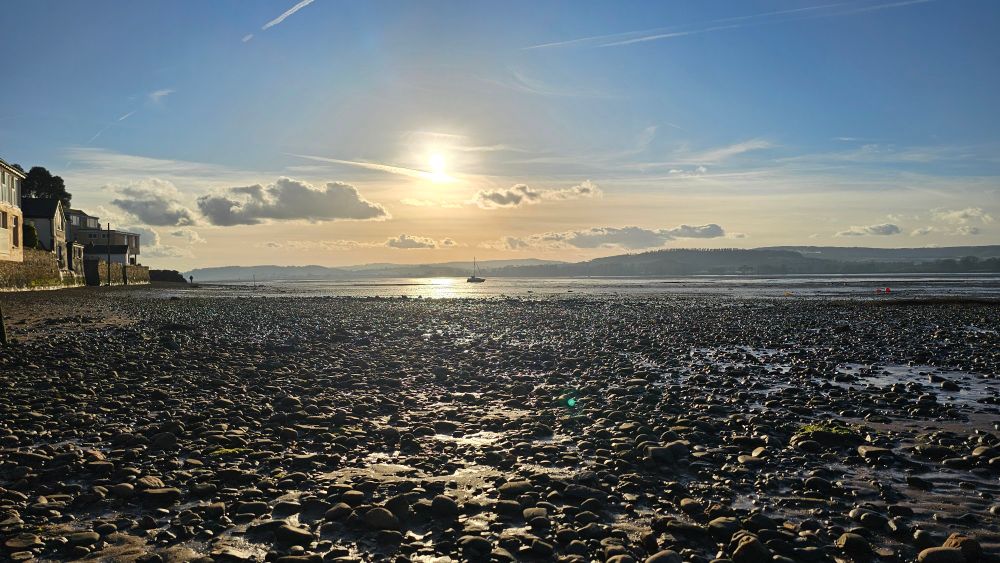The view from Lympstone quay as the sun starts to set on the horizon