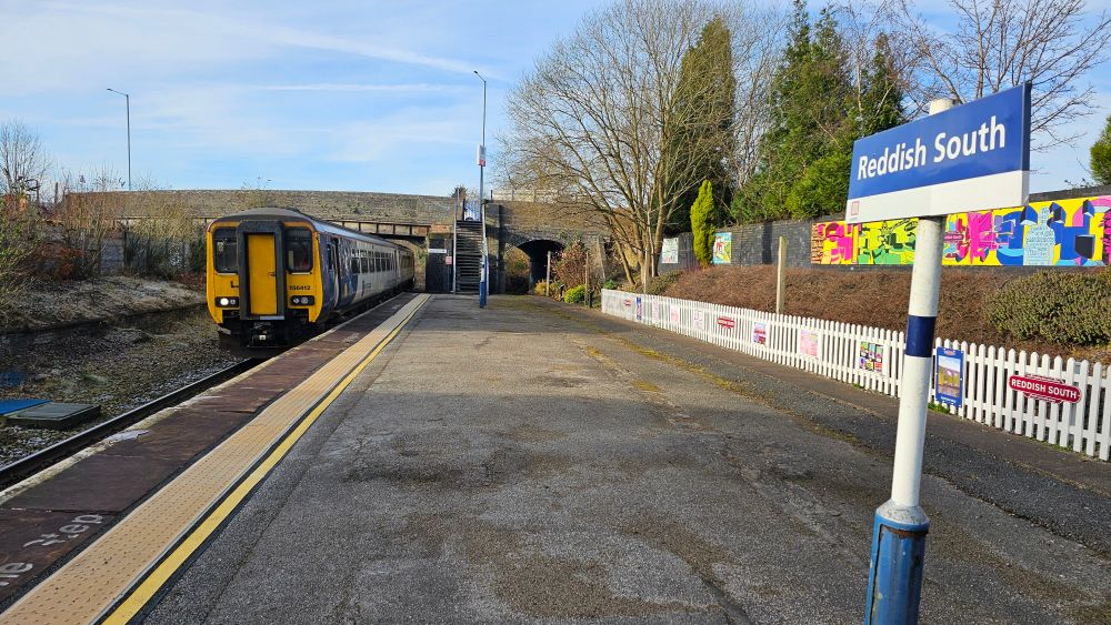 The once-a-week train from Stockport to Stalybridge arrives at Reddish South station