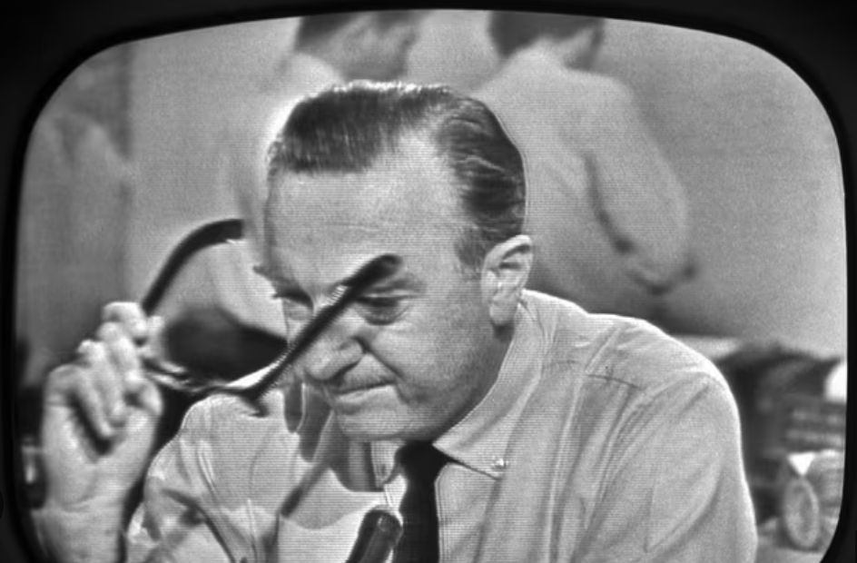 Walter Cronkite announcing the death of JFK.