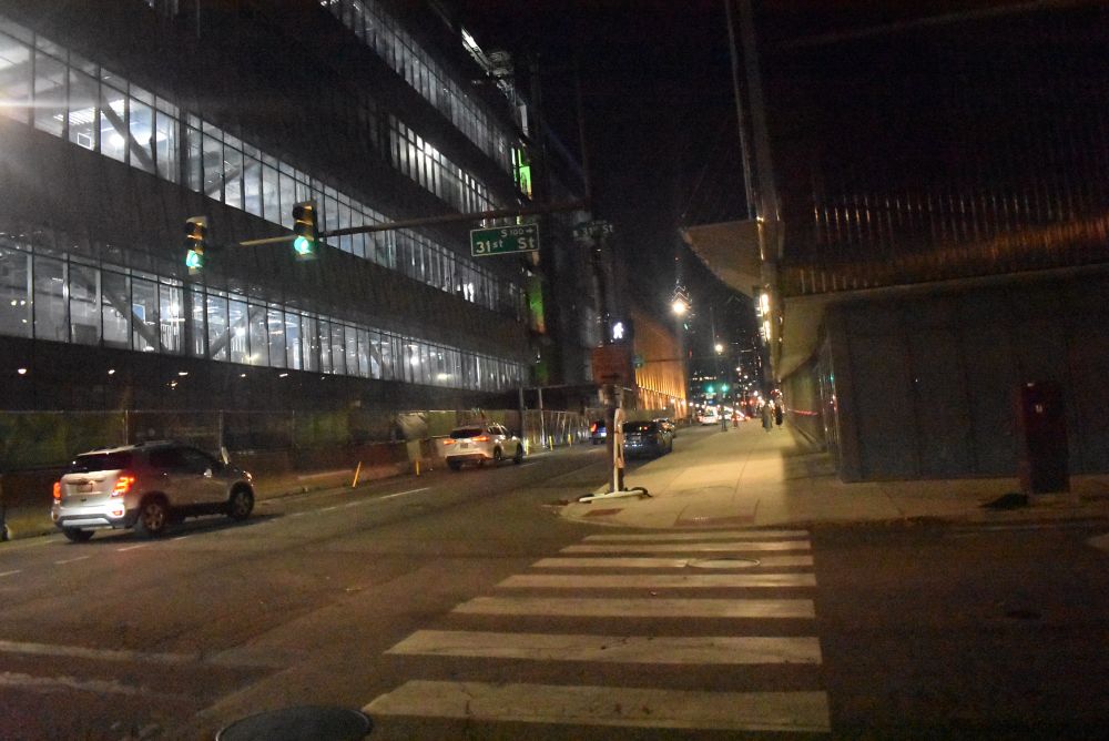 3100 chestnut street. Facing east with nearly completed building on left, another building on right, and traffic.