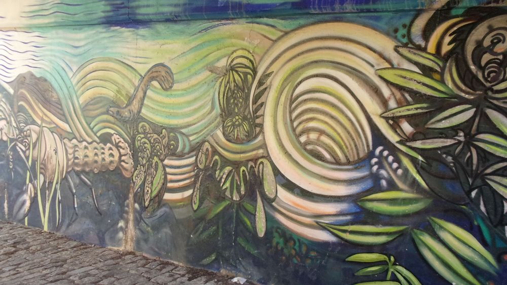 Fountain Street steps. Painted side wall with dinosaurs and circles and leaves.