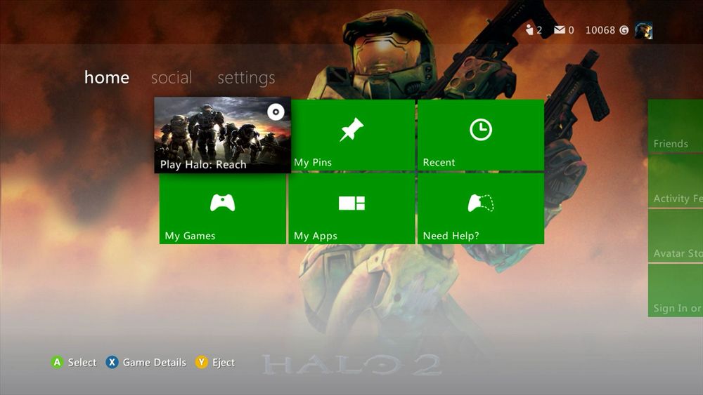 Xbox 360 home screen displaying game options, with "Play Halo: Reach" highlighted; Halo 2 character artwork is in the background.