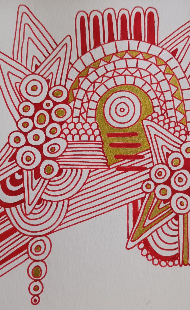 an abstract type pattern drawn in red ink with some gold gel pen colouring on it