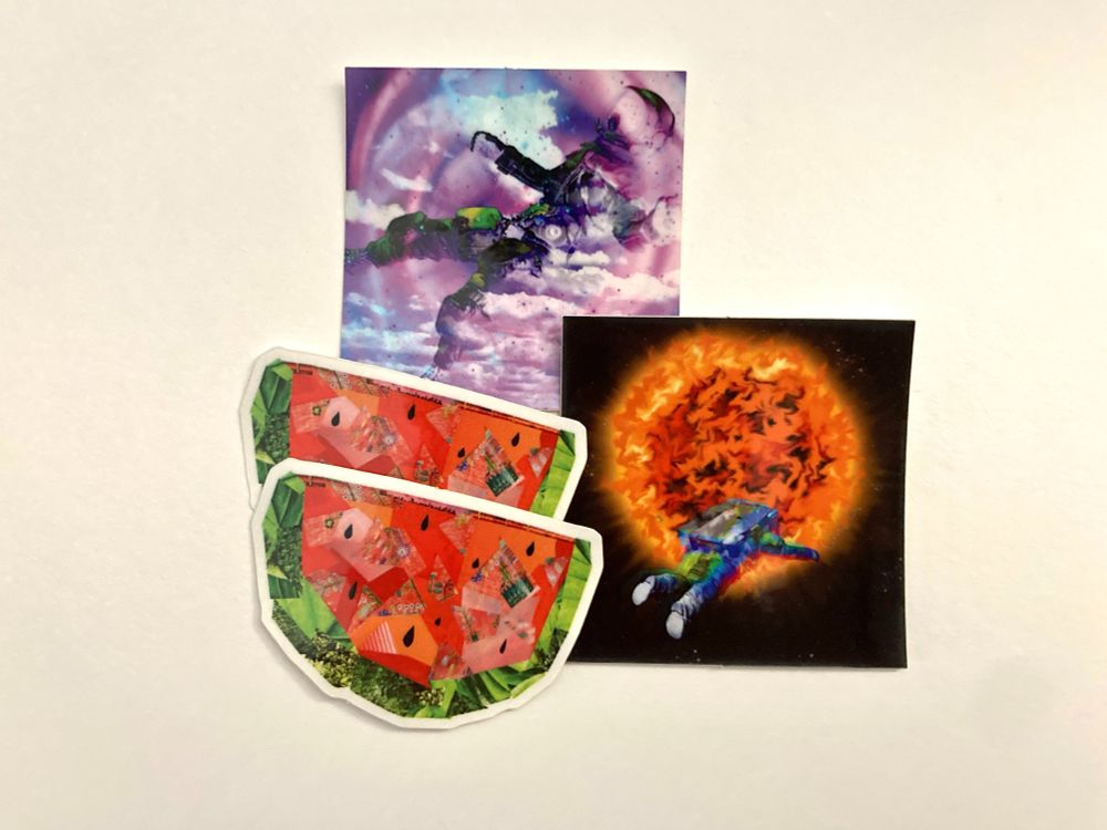 A collection of three different stickers. One sticker has a black background with a swirling orange sun in the middle and an astronaut floating towards it. Another sticker is a collage of a watermelon with various hues of pinks and reds, black teardrop shaped seeds and a green rind also with different shades ranging from light to dark. The last sticker is the silhouette of an astronaut blended into a swirl of purple, pink, and blue hues with clouds in the background.